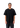 Female model front view wearing oversized plain black t-shirt with short sleeves.