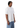Male model opposite side profile wearing plain white oversized t-shirt.