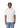 Male model wearing plain white oversized t-shirt, front view, relaxed fit.
